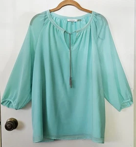 Top Calvin Klein donna XL, blusa a maniche lunghe in chiffon blu acqua con catena argento - Foto 1 di 7