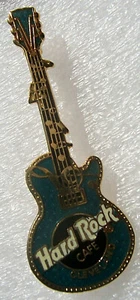 GUITARRA VERTICAL CLEVELAND GIBSON LES PAUL NOTAS MUSICALES DORADAS Hard Rock Café PIN - Imagen 1 de 1