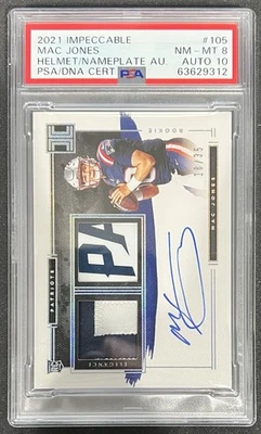 2021 Impeccable Elegance Helmet/Nameplate Mac Jones 18/35 PSA - Image 1 of 2