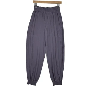Athleta Hose Damen 2 lila Jogginghosen Gummibund Reißverschlusstasche Bündchen sportlich - Bild 1 von 14