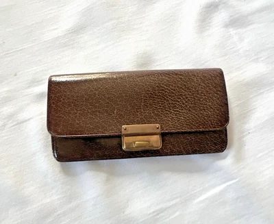 Estuche de monedas vintage raro estilo acordeón de cuero marrón oscuro y latón, años 50 Foto 1 de 4