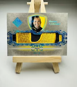 2012 Press Pass Total Memorabilia FIRESUIT BLUE FOIL /10 Marcos Ambrose #TM-MA - Picture 1 of 2