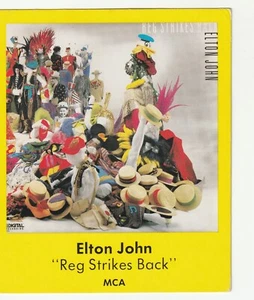 RARE MUSIC PROMO STORE AD 5 1/2" X 4 1/2" - ELTON JOHN - REG STRIKES BACK - Picture 1 of 2