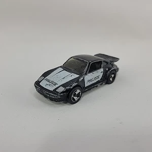 Hot Wheels 1989 Black Police Porsche veicolo pressofuso scala 1:64 - Foto 1 di 7
