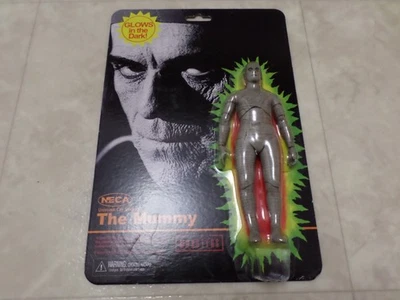 Figura de acción NECA Universal Monsters The Mummy Brilla en la oscuridad 7" nueva Foto 1 de 4