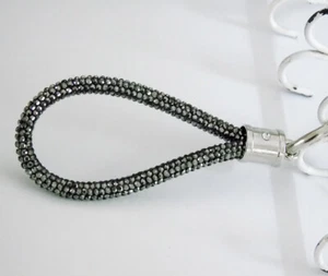 SCHLÜSSELANHÄNGER HEMATITE / Schwarz metallic/ Rhinestone Rope / Glitzerkordel - Picture 1 of 4