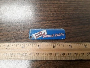 The Simpsons Flipper Party von Stern Schlüsselanhänger Sammlerstück - NEU - Bild 1 von 1