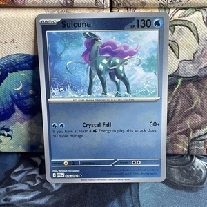 Suicune 026/094 Me02: Phantasmal Flames REVERSE HOLO NM - Picture 1 of 4