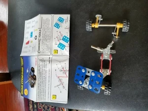 Motocicleta de juguete de metal Tec vintage REMCO cuatro ciclos acero con instrucciones - Imagen 1 de 2
