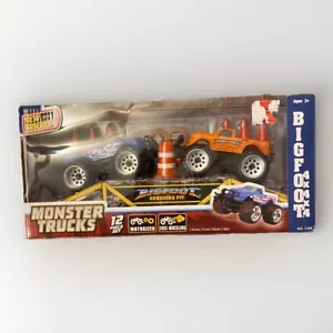 Bigfoot Monster Trucks 2 Pack Blue and Orange New Bright Toys 12 Piece Set - Picture 1 of 8