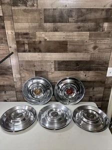 1954 54 1955 55 Cad Cadillac cubierta de rueda tapacubos 15" OEM lote de cinco Eldorado�� - Imagen 1 de 24