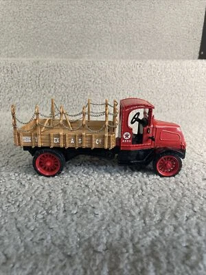 ERTL ARM & HAMMER 1918 MACK AC BULLDOG FLATBED 1:33 SCALE DIE CAST BANK - Image 1 of 4