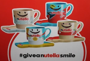 RAR!! 4er SET NUTELLA TASSEN UND UNTERTASSE - LIMITED EDITION - 60 JAHRE NUTELLA - Bild 1 von 11