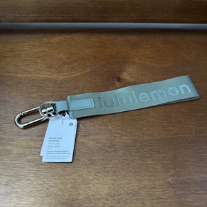 Lululemon Never Lost Keychain in Dark Green - NWT - Picture 1 of 5