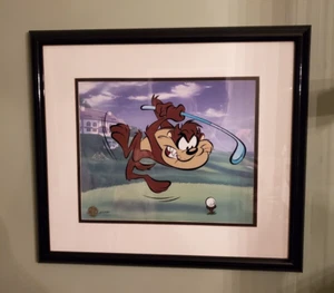 TAZ THE TAZMANIAN DEVIL SERICEL "GOLFING" NUMBERED 277/750 ARTWORK - FRAMED - Picture 1 of 6