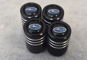4 Black Barrel Valve Stem Covers Tri-Stripped Fits Subaru - Picture 1 of 6
