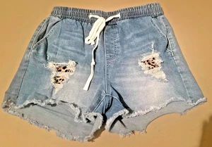 Jeansshorts mit Gepardenmuster (Stretch) - Bild 1 von 3