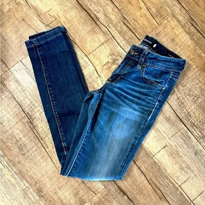Pantalones de mezclilla ajustados de tiro bajo azules desgastados con estilo a mediano talla 3 Foto 1 de 4
