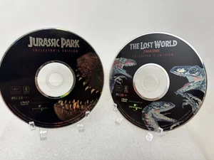 Jurassic Park &The Lost World DVD * Widescreen DISCS ONLY no tracking tested - Foto 1 di 11