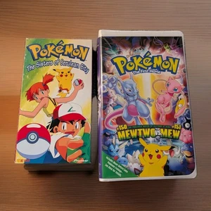 2 Pokemon VHS-Pokemon~The First Movie & The Sisters Of Cerulean City  - Imagen 1 de 13