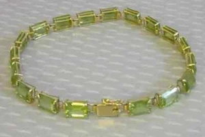Lab Created Peridot Women Tennis Bracelet 4Ct Emerald Cut 14K Yellow Gold Plated - Picture 1 of 4