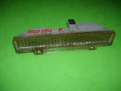 Luz de lámpara de estacionamiento delantera derecha 88 Cadillac Deville Fleetwood 16500050 giro intermitente Foto 1 de 4