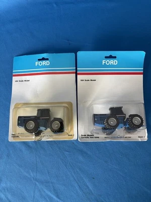 1/64 Scale Models "Set of 2" Ford 876 & 976 4 Wheel Drive Tractors, New in packs - Image 1 of 4