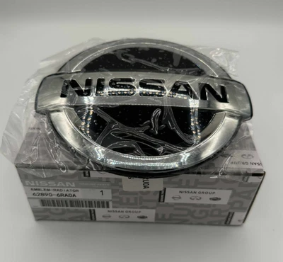 62890-6RA0A emblema parrilla delantera para Nissan Rogue 2021-2023 envío gratuito Foto 1 de 3