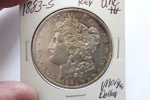 T 1883-S TONING KEY DATE FULL BREAST FEATHERS UNC+++ MORGA SILVER DOLLAR - Picture 1 of 2