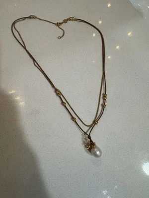 COLAR PINGENTE PÉROLA TORY BURCH KIRA Latão Laminado / Vachetta - Imagem 1 de 4