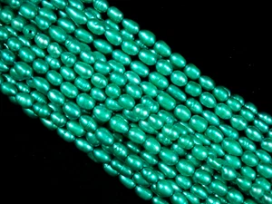Freshwater Pearls Neon Jade Rice 5-7mm Irregular 35cm Strand  - Bild 1 von 1