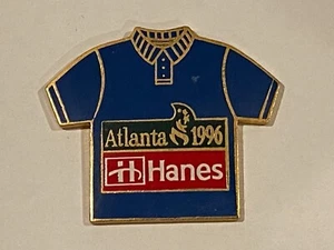 1996 Atlanta Olympic Games Enamel Vest Hat Lapel Pin Hanes Polo T-Shirt Sponsor - Picture 1 of 2