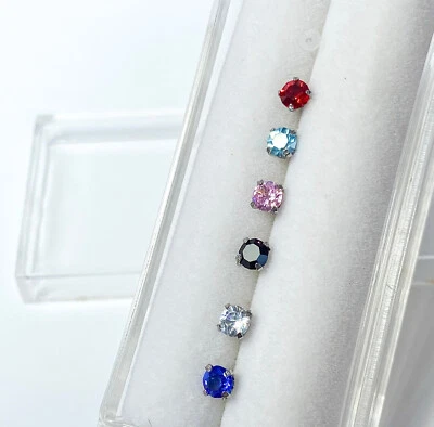 Paquete de 7 piezas de anillos de hueso de nariz de acero con gema de circonita cúbica 20 g, incluye retenedor Foto 1 de 4