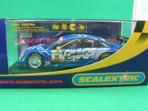 SCALEXTRIC C2592 OPEL VECTRA GTS V8 DTM BLUE #10 MANUEL REUTER Neu in OVP - Bild 1 von 3