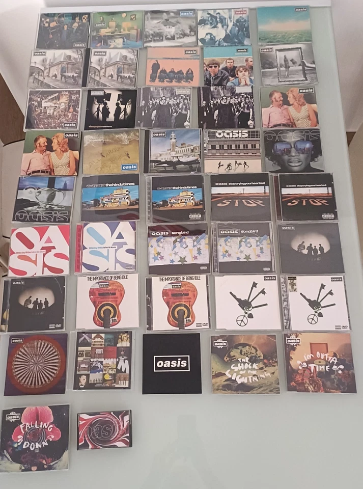 Oasis – Collezione Completa Singoli CD/DVD + Rarità, CD Perfetti, Custodie Rotte - Immagine 1 di 1