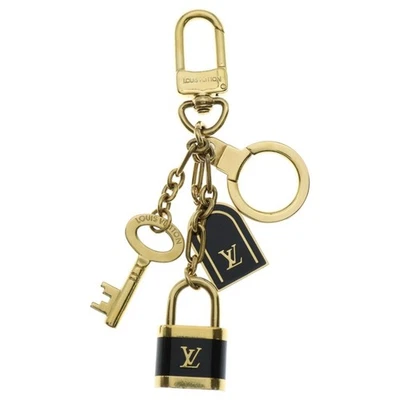 Chaveiro Louis Vuitton Portocre Cadena bolsa charme chaveiro ouro × marrom GP usado d8 - Imagem 1 de 4