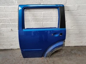 Dodge Nitro 2007 puerta trasera izquierda desnuda azul - Imagen 1 de 4