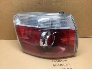2007-2012 GMC Acadia LEFT OUTER Tail Light 15130009 off a 2010 - Picture 1 of 3