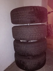 Alufelgen incl. Winterreifen mit Felgenbaum und Plane - Bild 1 von 4