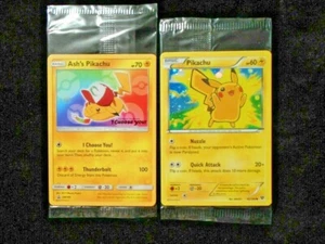 Ash's Pikachu Promo Sm108 & Holo 42/146 2 paquetes de películas selladas lote de cartas de Pokémon - Imagen 1 de 5