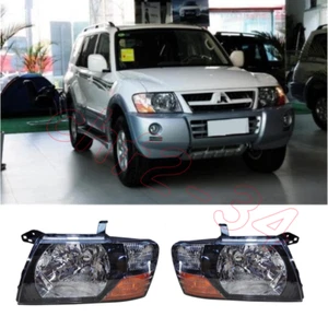 For 2000-2005 2006 Mitsubishi Pajero Montero Front Head Lamps Lights Left+Right - Foto 1 di 8