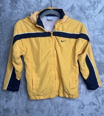 Chaqueta cortavientos Nike Athletics para niños con capucha amarilla talla 7 cremallera Foto 1 de 4