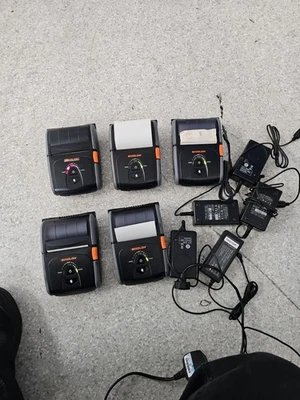 5 X IMPRESORAS TÉRMICAS MÓVILES BIXOLON SPP-R300 + FUENTE DE ALIMENTACIÓN. Foto 1 de 4