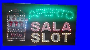 INSEGNA A LED CON SCRITTO SALA SLOT APERTO CON SIMBOLO 70x40 - Foto 1 di 1