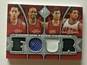 2009-10 SP juego usado cuatro en telas/99 Vince Carter Brook López Devin Harris - Imagen 1 de 3
