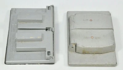 LOTE DE 2 FUNDAS CAJA OUTLET UBICACIÓN HÚMEDA DÚPLEX PUNTO ROJO LEVITON METALIZADAS Foto 1 de 2