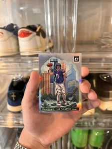2024 Donruss Optic J.J. Mccarthy Downtown! - (RC) #11 - Case Hit SSP - Vikings - Picture 1 of 8