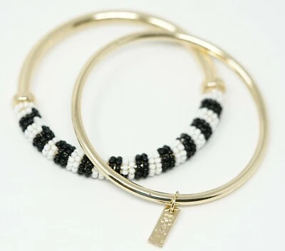 Trina Turk x tono dorado 2 piezas Conjunto de pulseras brazaletes clásicas y con cuentas Foto 1 de 4