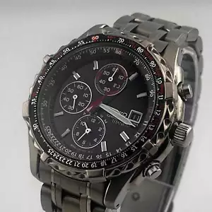 Reloj para hombre SEIKO 7T62-0BY0 CRONÓGRAFO TITANIO esfera plateada negra 38,8 mm - Imagen 1 de 20