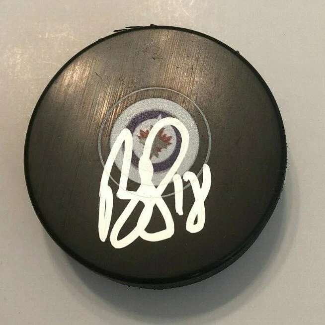 PUCK DE HOCKEY BRYAN LITTLE FIRMADO WINNIPEG JETS CON ESTUCHE CERTIFICADO DE AUTENTICIDAD Foto 1 de 1